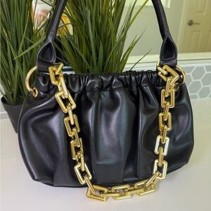 Elegant Black Leather Bag with Gold Chain